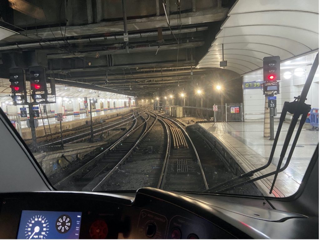 View from train cab of country end of platform 18 at Liverpool Street and tracks in station throat